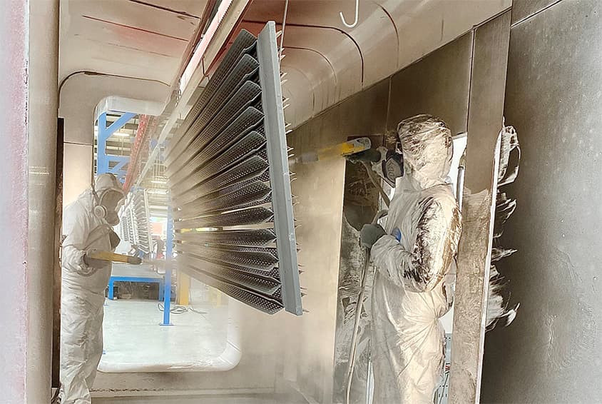 Frenger's X-Wing Passive Chilled Beam being powder coated in RAL 9006 Frenger Powder Coating Process